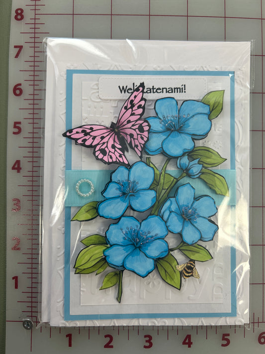 Wëlí katënamí! Happy Birthday Card “Blue Blossoms w/ Pink Butterfly”